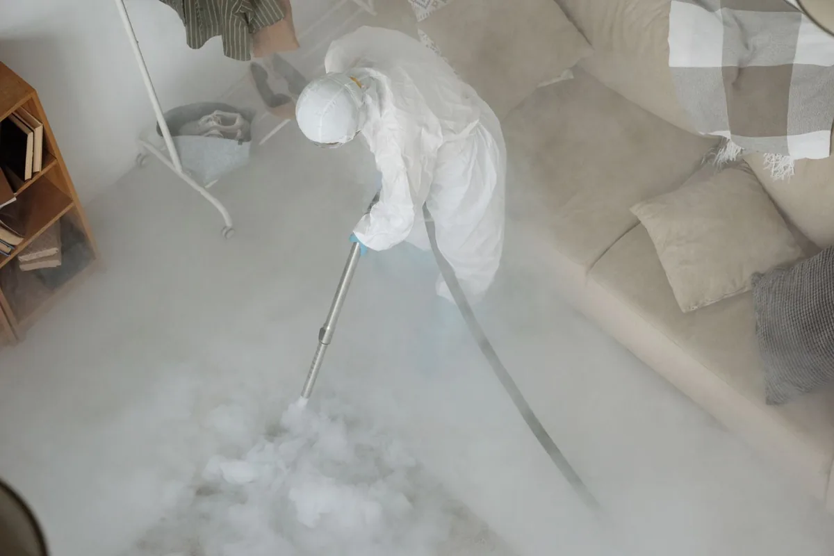 Biohazard cleanup technician in protective equipment, Iselin, NJ